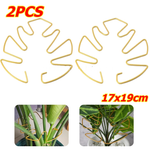Two gold leaf-shaped plant stem support hoops, 17 x 19 cm